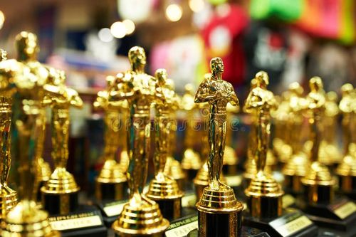 NEW YORK CITY - MARCH 27: Oscar statues souvenirs at a gift shop in New York on March 27, 2014. Oscar stock images, royalty-free photos and pictures