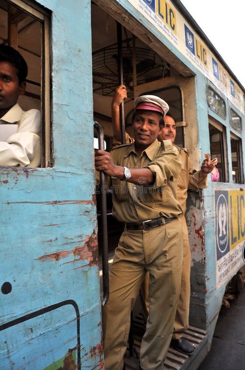 KOLKATA, INDIA - 27 OCTOBER, 2009: An unidentified group of indian people go by tram in Kolkata on October 27, 2009. The Kolkata tram is the oldest operating electric tram of Asia, running since 1902. Kolkata tram stock images, royalty-free photos and pictures
