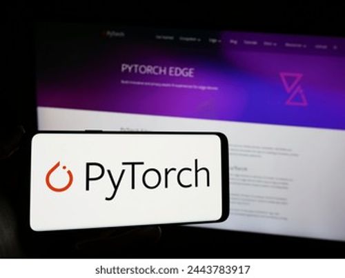 Stuttgart, Germany - 03-12-2024: Person holding mobile phone with logo of machine learning library PyTorch in front of web page. Focus on phone display. Unmodified photo. Editorial Stock Photo