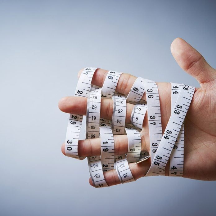 Tools for installation including tape measure, level, and screwdriver