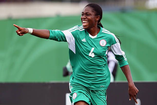 CAF, Asisat Oshoala of Nigeria celebrates her team's second goal during the FIFA U-20 Women's World Cup Canada 2014 Quarter Final match between Nigeria...