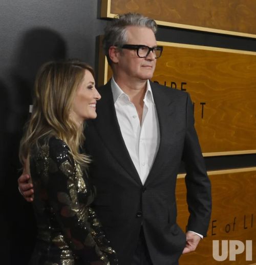 Colin Firth and Maggie Cohn Attend the "Empire of Light" Premiere in Beverly Hills