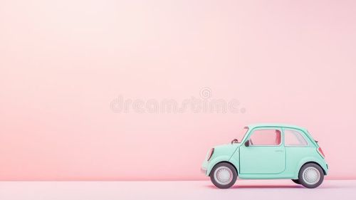 A mint green toy car is placed on a soft pastel pink background showcasing a playful and minimalistic design ideal for youthful decor. Mint green car stock images, royalty-free photos and pictures