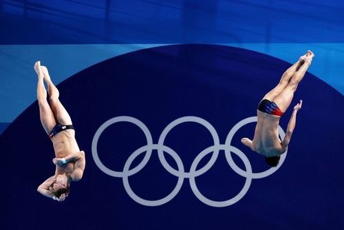 United States' Tyler Downs and Greg Duncan compete in the synchronised diving event at the Paris 2024 Olympic Games Paris 2024 at Aquatics Centre on August 02, 2024 in Paris, France.