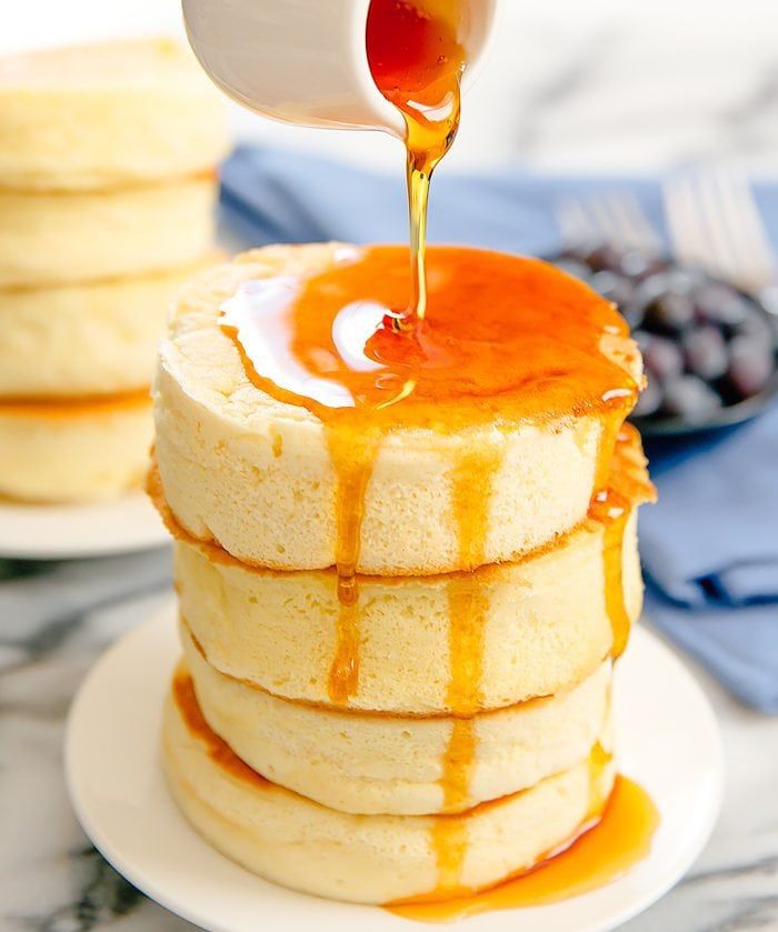 syrup being poured over a stack of Japanese Souffle Pancakes