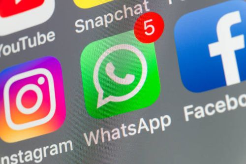 whatsapp, facebook, instagram and other cellphone apps on iphone screen - whatsapp stock pictures, royalty-free photos & images