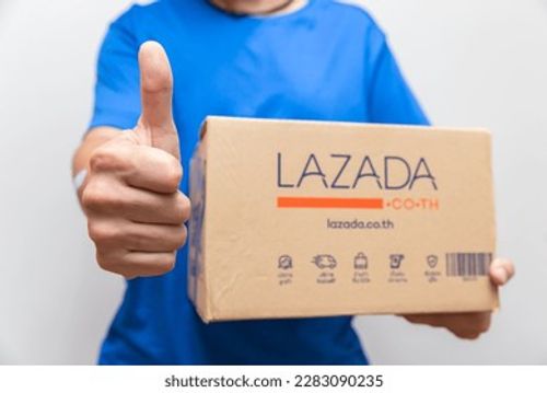 Delivery Man with Lazada box thumbs up, Popular online shopping mall in Thailand,14 August 2018,Bangkok,THAILAND. Editorial Stock Photo