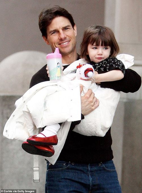 Tom Cruise pictured alongside his daughter Suri in December 2008