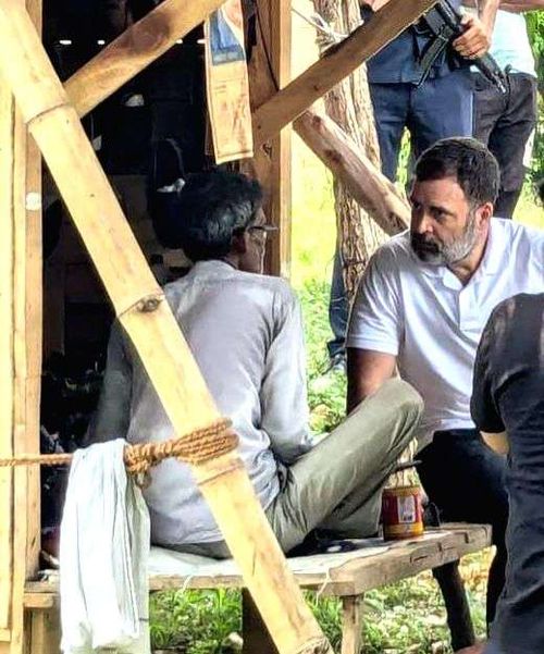 Sultanpur : Congress MP & LoP Lok Sabha Rahul Gandhi meets and interacts with a cobbler during his visit to UP's Sultanpur on Friday, July 26, 2024.