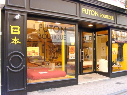 A shop in France selling westernized futons with frames