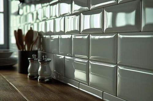 Kitchen Countertop With Modern Tiles and Kitchenware Illuminated by Warm Evening Light. photo