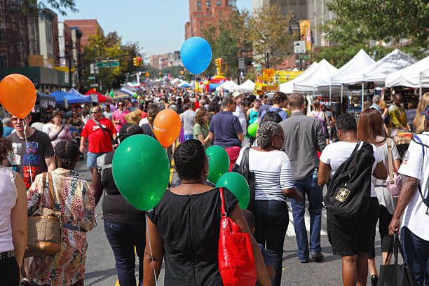 view along atlantic antic street fair in brooklyn - multicultural festival stock pictures, royalty-free photos & images