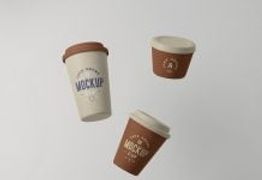 Free Floating Three Paper Coffee Cup Mockup PSD