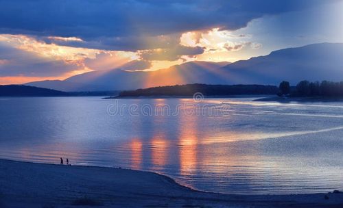 Incredibly beautiful sunset. Sun,sky. Sunset or sunrise landscape, panorama of beautiful nature. Sky with amazing colorful clouds. Fantasy design. Modern Art. Magic Artistic Wallpaper. Dream, line. Background, colorful. Watercolor illustration. Orange Background for relax. Blue Color. Lake,water. Travel,relaxation. Nature stock images, royalty-free photos and pictures