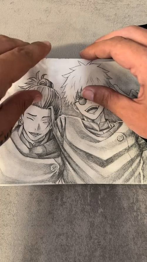 This may contain: someone is drawing some anime characters on paper