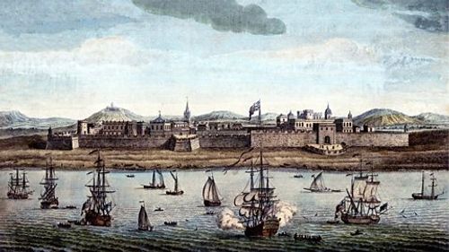 A painting of Fort St George overlooking a sea filled with ships.