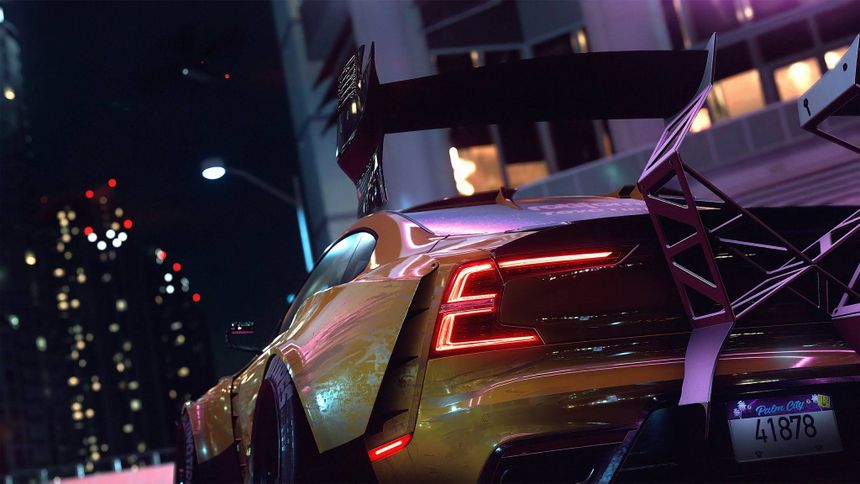 Gold race car with glowing taillights parked in a neon city at night. — Need For Speed Heat Picture