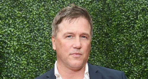Lochlyn Munro posing for the photo