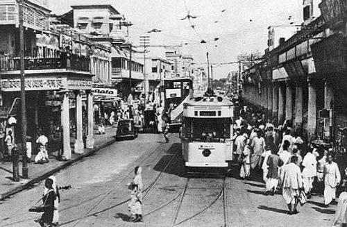 Tram on a busy city street