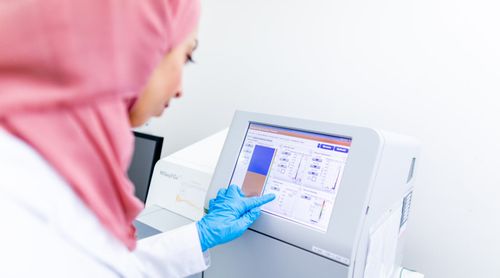 Science student using equipment