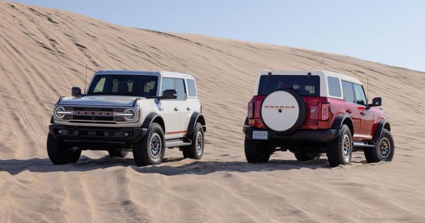 Ford Bronco SUVs driving on sand dunes available at Irvine Ford