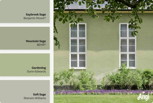 Side of sage green home, including different tones of sage green paint