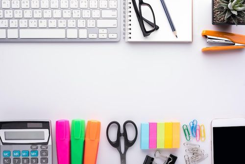 Photo directly above shot of office supplies on table