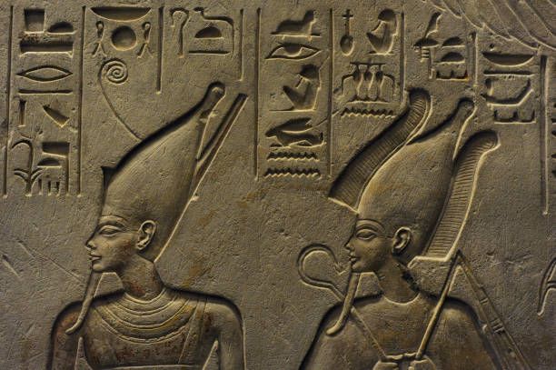 Ancient Egypt. Stele of Haremheb, head of the Army to reign Tutankhamen. The deceased adoring three gods Detail Atum and Osiris. Limestone. 14th-13th...