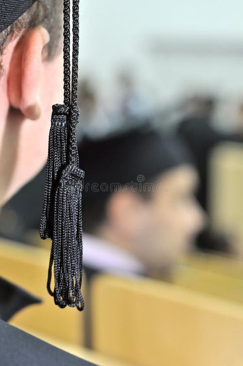 Students attending the graduation ceremony. Bachelors degree stock images, royalty-free photos and pictures