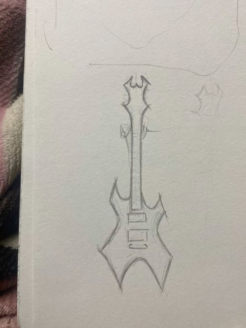 a drawing of an electric guitar on paper