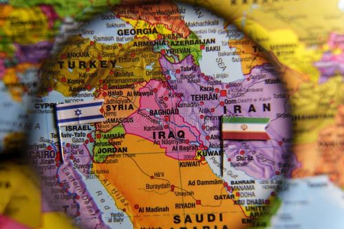 Magnifying glass focusing on Iran with Iranian and Israeli flags on the map, symbolizing rising geopolitical conflict and regional tension. June 19, 2025. Israel iran map stock images, royalty-free photos and pictures