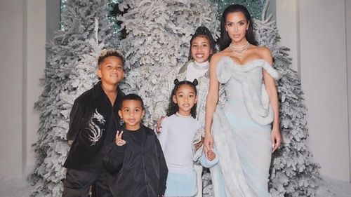  Kim Kardashian Keeps the Christmas Spirit Alive: Continuing Kanye's Festive Live Performances
