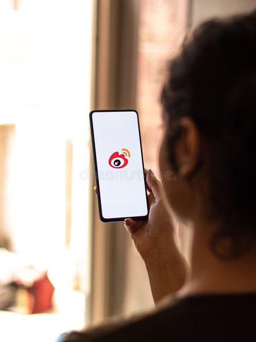 Assam, india - May 04, 2021 : Sina Weibo logo on phone screen stock image. Weibo app stock images, royalty-free photos and pictures
