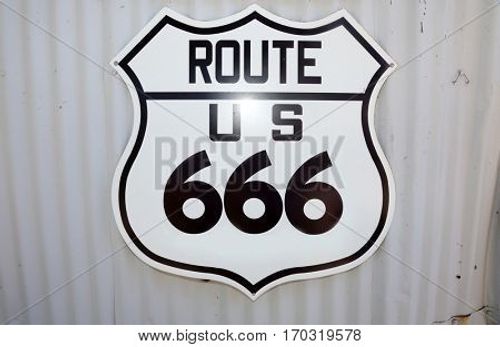 Route 666 sign on the side of a barn