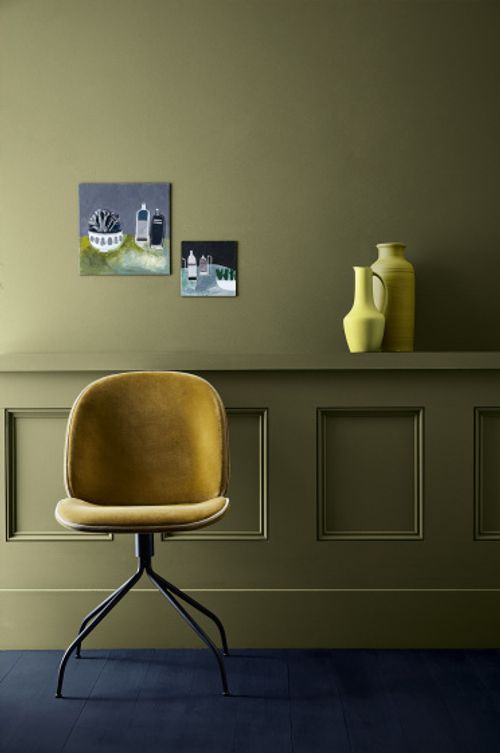 Mustard yellow velvet chair against a dark green panelled wall in Olive Colour and a dark indigo blue floor in Dock Blue.