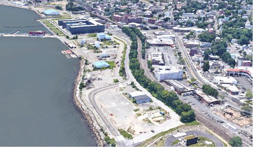 Waterfront view of Stapleton, NY, showcasing thriving local businesses and scenic urban charm, Zip Codes List 10304