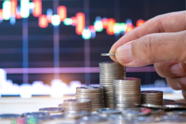 stack of coins with trading chart in financial, stock market, wealth economy, interest rate, inflation, long term investment, - long-term-investing stock pictures, royalty-free photos & images