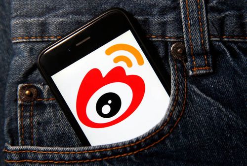 In this photo illustration, the Weibo logo is displayed on the screen of an iPhone on November 25, 2019 in Paris, France. Weibo is a Chinese...