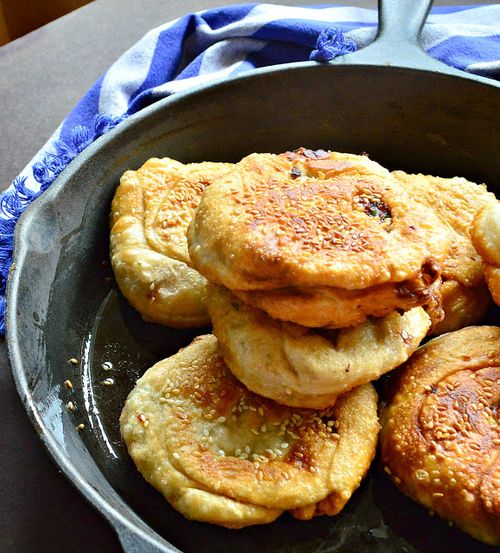 Enjoying Donghe Meat Pancake in a cozy setting