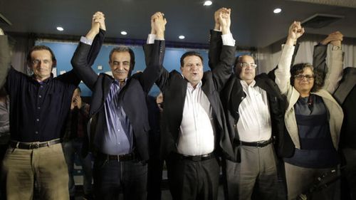 Les candidats de la liste des Arabes israéliens célèbrent leurs bons résultats, le 17 mars à Nazareth.