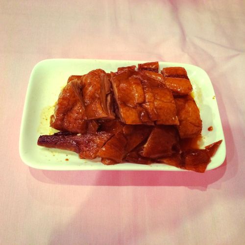 Street scene in Sham Shui Po with local diners