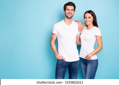 Portrait of his he her she nice attractive charming lovely cute pretty cheerful cheery best friends buddy fellow hugging isolated over bright vivid shine vibrant blue green turquoise background Stock Photo