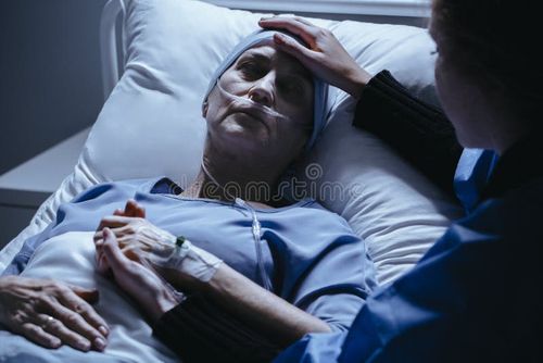 Caregiver supporting sick women with cancer dying in the hospital. Sick stock images, royalty-free photos and pictures