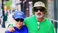 Rita Ora, 33, and husband Taika Waititi, 48, put on a very loved-up display in colourful gym wear as they go for a stroll in New York City | Daily Mail Online