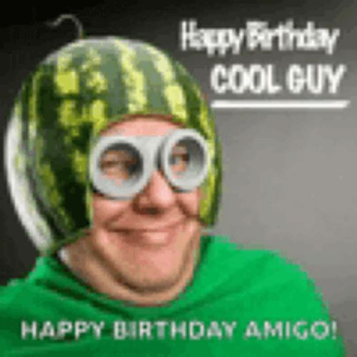 a man wearing a watermelon hat and goggles with the words happy birthday amigo