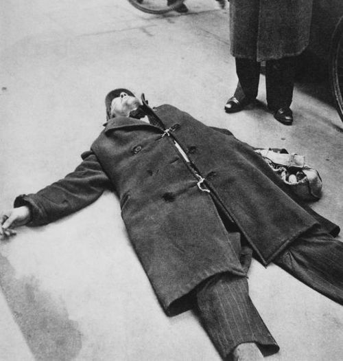 Man collapsed on the street from starvation during the Dutch famine of the winter of 1944-45, Netherlands, circa 1945.