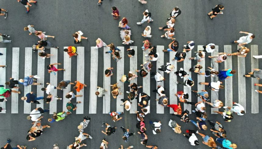 Aerial view of pedestrians in a crosswalk