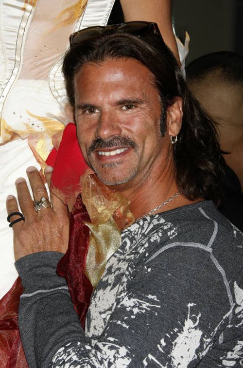 Actor Lorenzo Lamas arrives at the Famous Cupcakes Beverly Hills grand Opening hosted by the Kardashian Family on October 7, 2009 in Beverly Hills,...