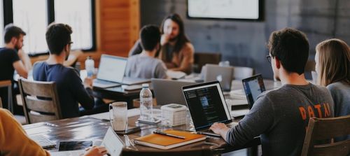 Photo community workshop for adults learning basic computer skills with laptops and digital presentation