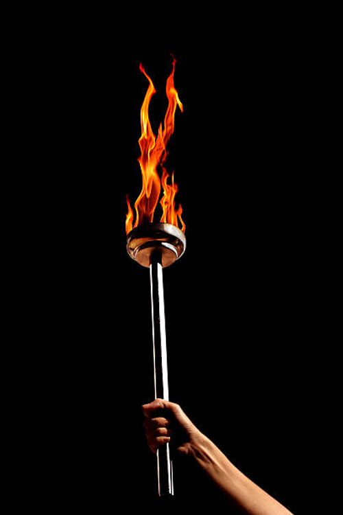 flaming torch - flaming torch stock pictures, royalty-free photos & images